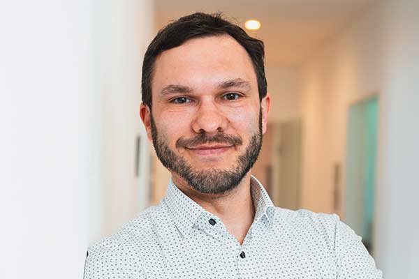 Portrait image of Dr. Markus Dick.